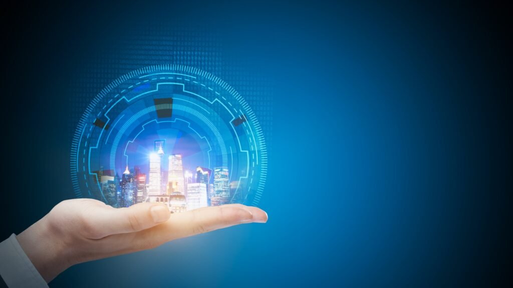 A futuristic digital cityscape floating above an open palm, surrounded by a glowing blue technology interface, symbolizing innovation and smart city development.