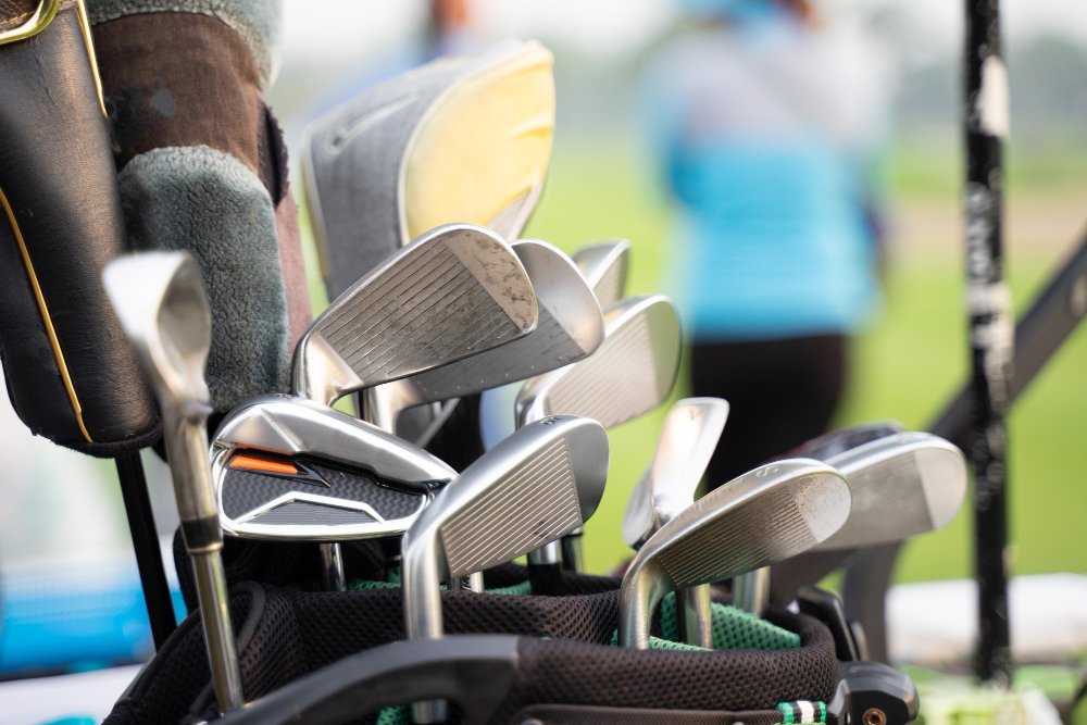 Golfers are about to play golf on bright green grass