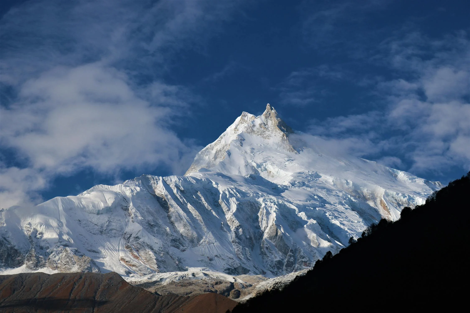 Majestic Mt. Manaslu standing tall at 8,163 meters, captured from the trail near Samagaon village.